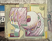 Holding head, mural in Porto
