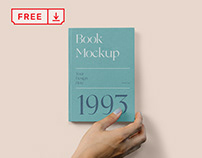 Free Hard Cover Book with Hand Mockup