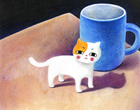 The cat in the coffee cup