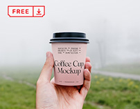 Free Coffee Cup in Park Mockup