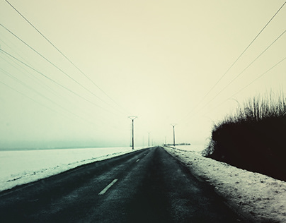 Winter, on the road with a smatphone