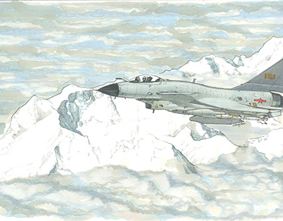 J-10 fighter flies over mountains