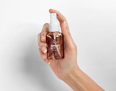 Free Spray Bottle with Woman Hand Mockup