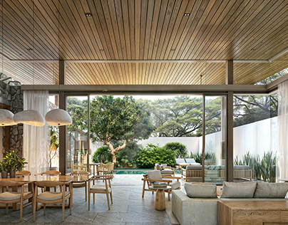 A modern Resort, looking out onto a garden.