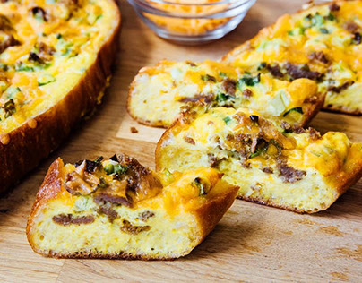 Sausage, cheese, and egg bread boats