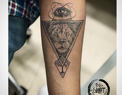 Geometric lion tattoo