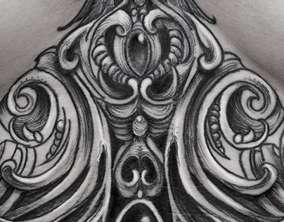 Black and grey underboob tattoo