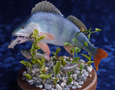 A diorama with a perch, handmade of polymer clay