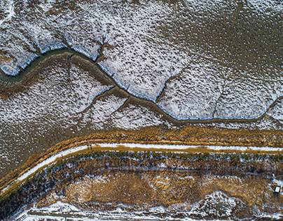 A snowy mudflat