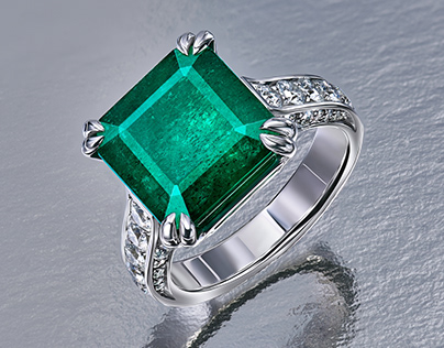 Retouching a platinum ring with an emerald