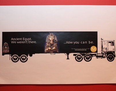 Ads on trucks for the Met