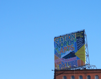 Station North Arts and Entertainment District billboard