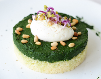 Spinach and couscous with poached egg