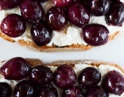 Oven baked grapes with ricotta and pine nuts