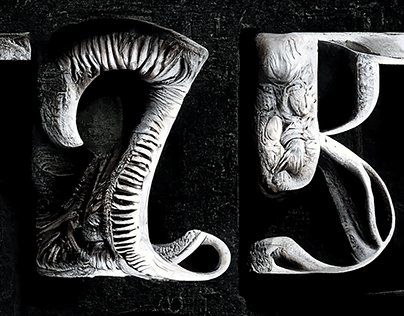 Organic lettering in the style of H.R. Giger