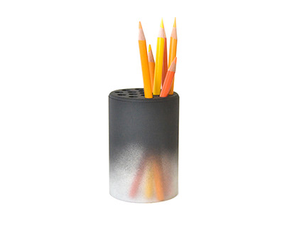 Briquette pencil holder