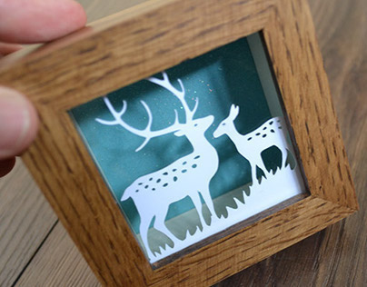 Reindeer miniature paper cut
