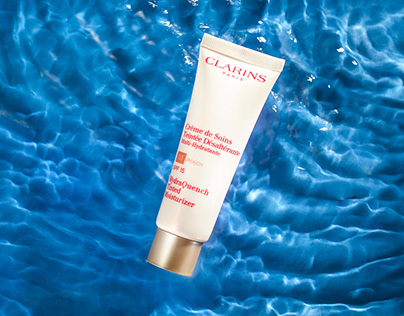 CLARINS. Product photo with water