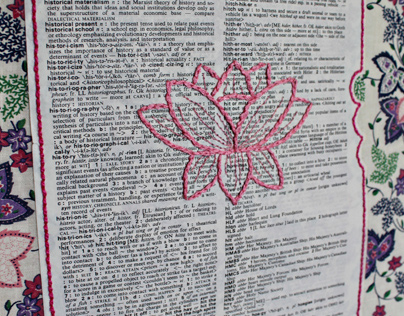 Embroidery on vintage dictionary page