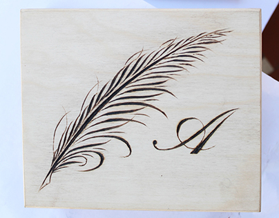 Pyrographed box for calligraphic instruments