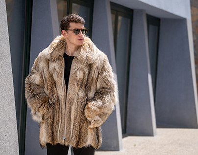 Coyote fur coat with a collar in beige color