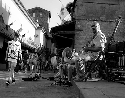 Florence Street Shot: Musicians and A Boy