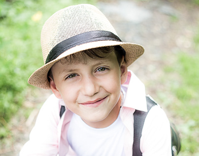 Portraits of kid boy in various summer activities