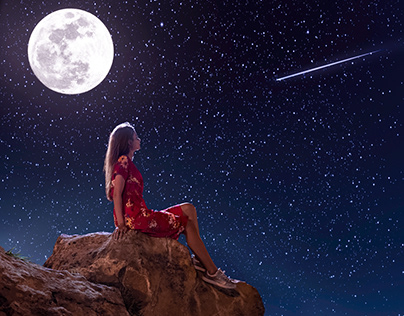 Woman enjoying of the starry night sky