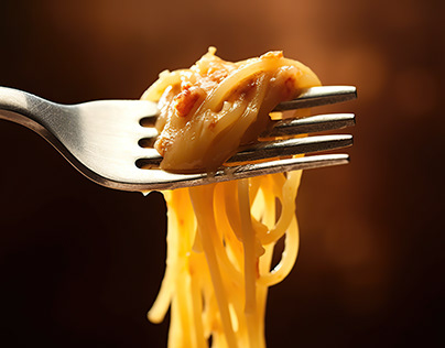 Tasty spaghetti rolled on fork