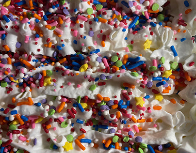 Rainbow Sprinkles On Whipped Cream