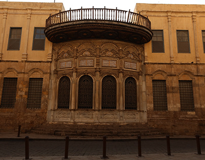 Iconic historic building on bustling Al-Muizz Street