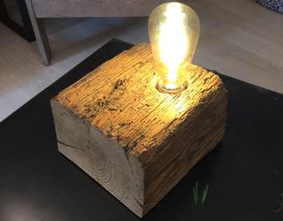 Industrial lamp with a piece of old larix