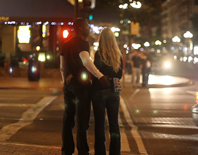 A Couple Hugging Beside the Road