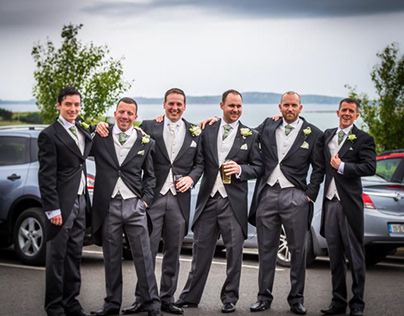 Groom with hushers and best man