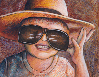 Boy in hat and sunglasses