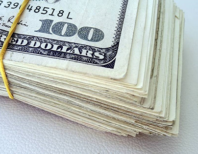 stack of hundred-dollar bills