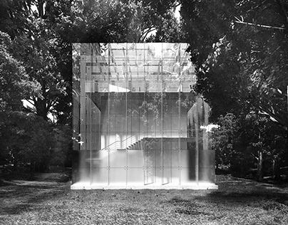 Contemporary glass structure in forest scene