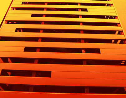Photographie immeuble orange dégradé fluo