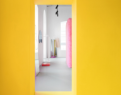 Pink furry walls and vibrant yellow surfaces.