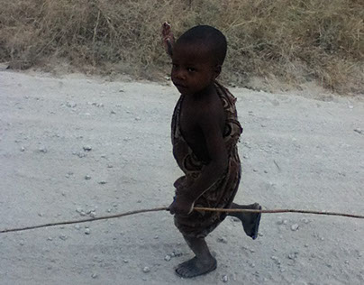 Little boy with a stick