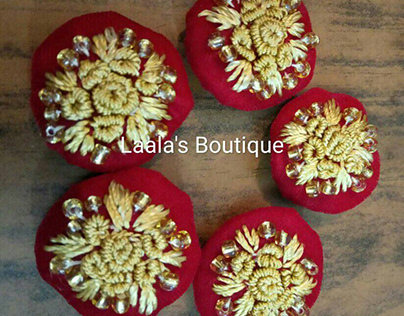 Velvet embroidered buttons done by Laala's Boutique.