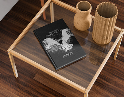 Free Hardcover Book on Table Mockup