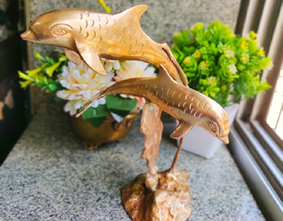 Rs. 2400 
Antique Brass Dolphin Mother and Calf statue