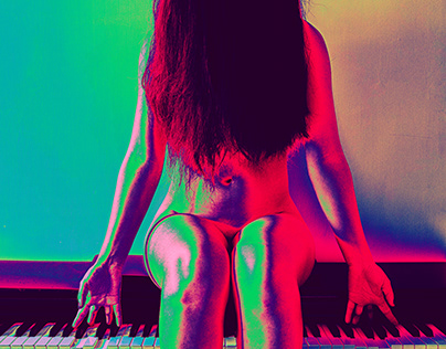 Girl Sitting On Pianoforte
