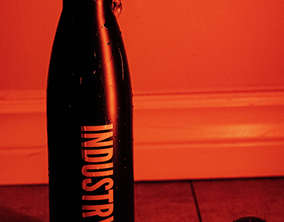 Red aesthetic bottle photography