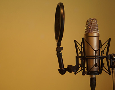 Microphone on yellow background