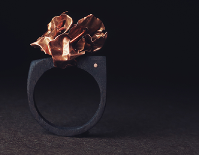 concept ring made of walnut wood and copper