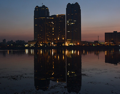 Nile City Towers reflection