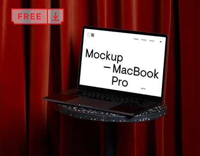 Free MacBook Pro on Coffee Table Mockup