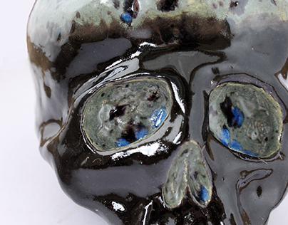 Black ceramic hand made skull with crystals glaze